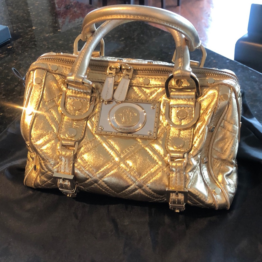 Versace gold leather satchel. I believe it’s from around 2005-2006 collection.